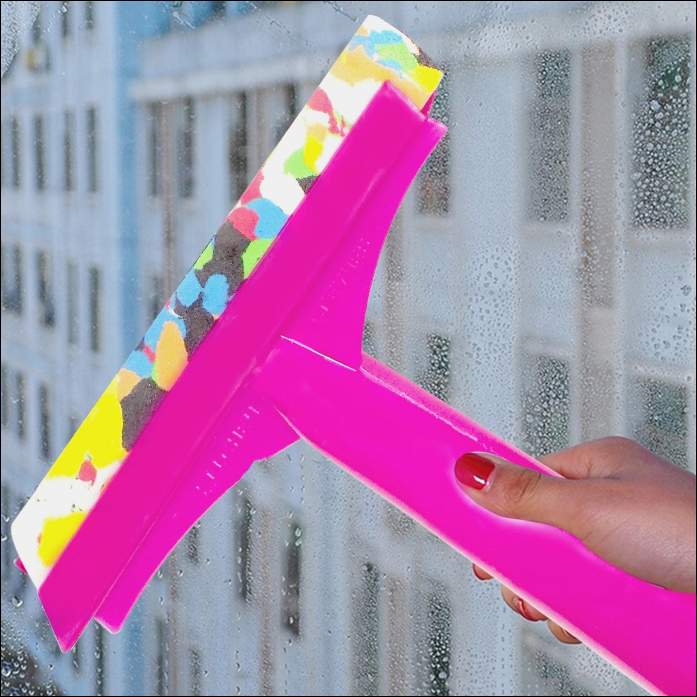 Bright pink floor cleaning wiper with handle for easy window and surface cleaning
