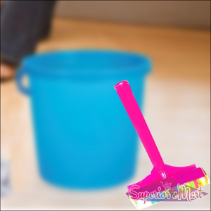 Colorful floor cleaning wiper with handle against a blue bucket for efficient cleaning tasks