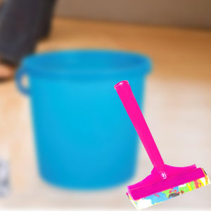 Colorful floor cleaning wiper with handle against a blue bucket for efficient cleaning tasks