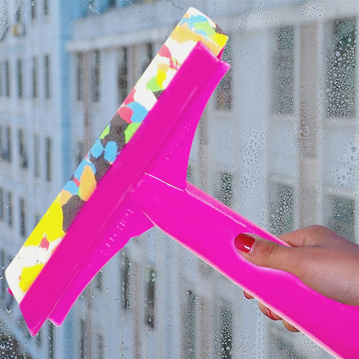 Bright pink floor cleaning wiper with handle for easy window and surface cleaning