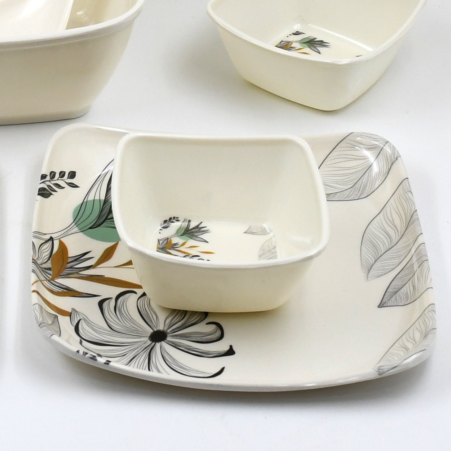 Superior eMart 11 piece tableware dinner set with floral and leaf design on white square plates and bowls