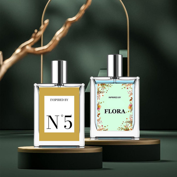 Florra & N5 Inspired perfume bottles displayed on black and gold platforms with elegant background