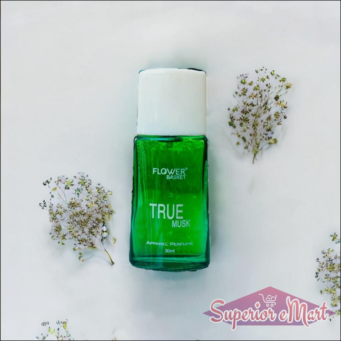 True Musk perfume 30ml in a green glass bottle surrounded by delicate flowers