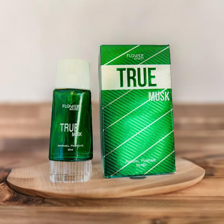 True Musk perfume 30ml bottle with green packaging on a wooden surface