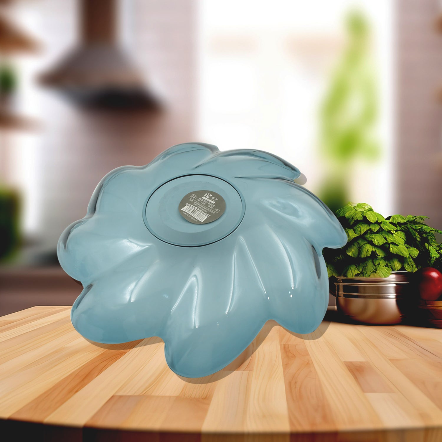 Flower shaped plastic fruit plate in blue design for serving fruits or snacks at home