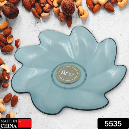 Flower shaped plastic fruit plate in blue, perfect for serving snacks and fruits
