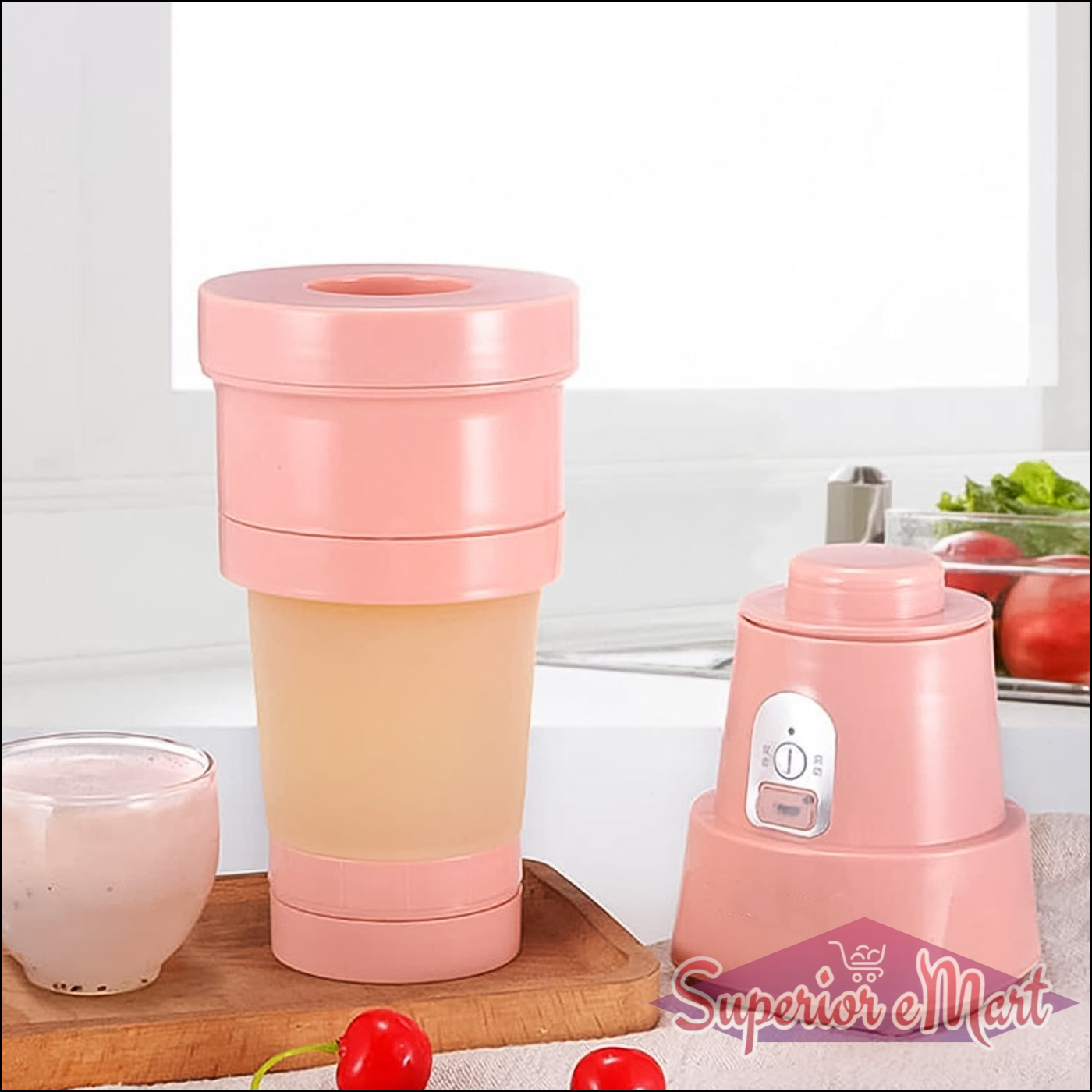 Foldable electric juicer blender in pink with compact design for easy storage and blending