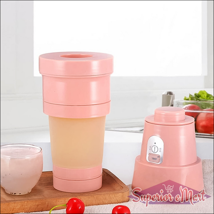 Foldable electric juicer blender in pink with compact design for easy storage and blending