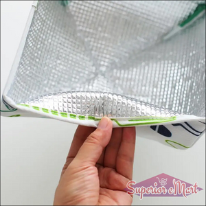 Close-up of a foldable food cover for kitchen with a reflective interior and vibrant design