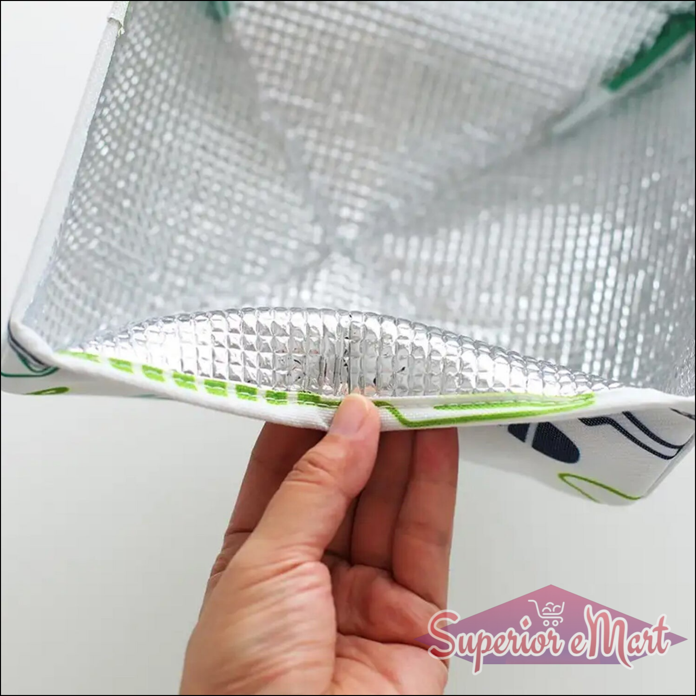 Close-up of a foldable food cover for kitchen with a reflective interior and vibrant design