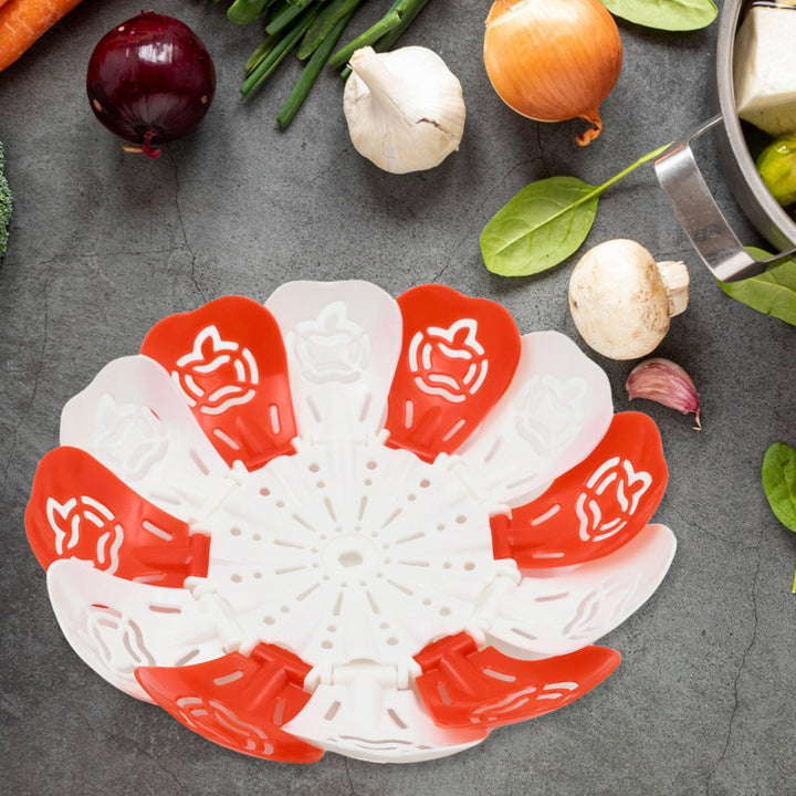 Innovative folding fruit basket for kitchen with vibrant red and white design for easy storage