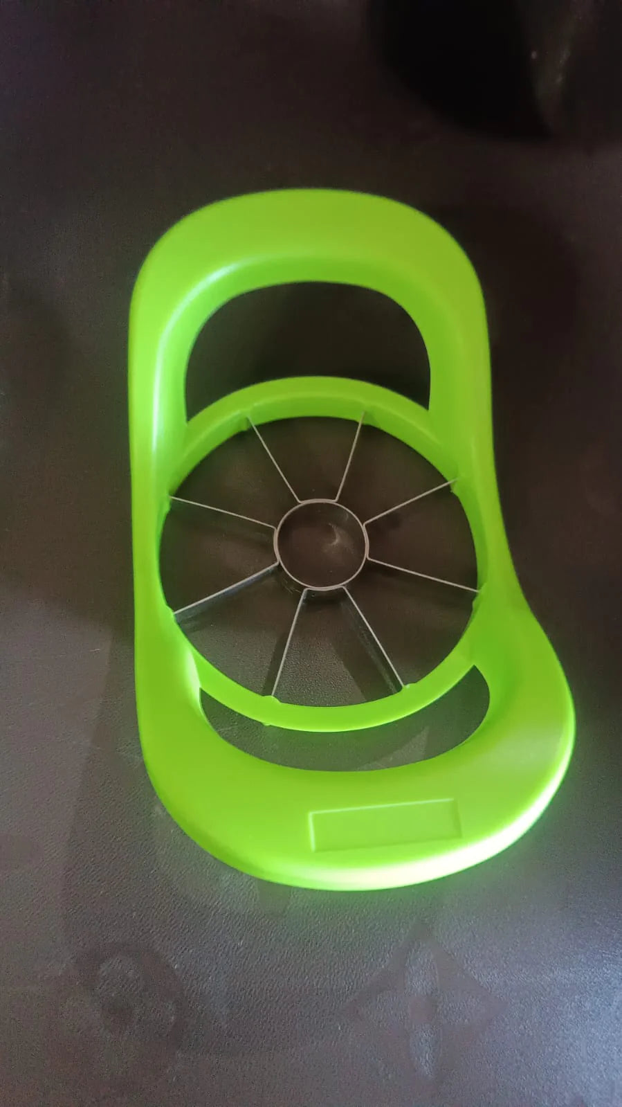 Bright green fruit slicer apple cutter for easy and efficient apple slicing in the kitchen