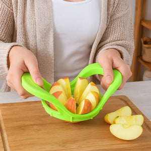 Green fruit slicer apple cutter for evenly slicing apples with ease in the kitchen