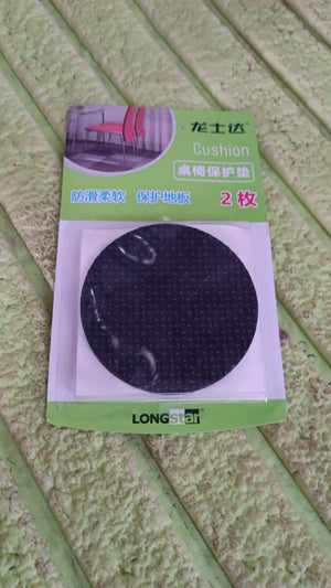 Furniture protection pads in black packaging for safeguarding floors from furniture scratches