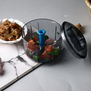 Lock unlock push chopper filled with fresh vegetables for easy meal preparation