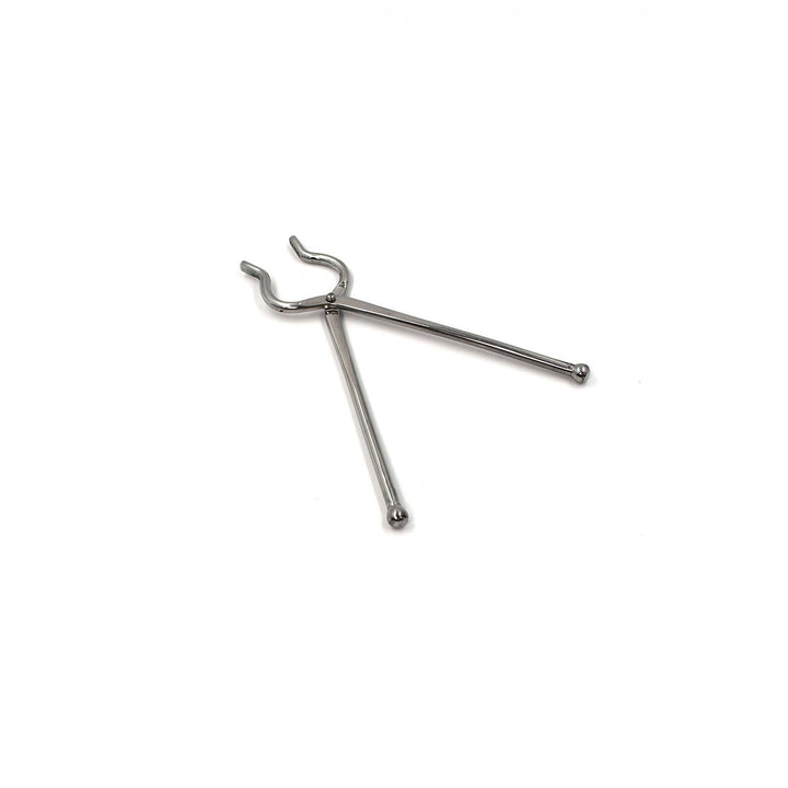 Stainless steel utensil holder tongs featuring durable and sleek design for kitchen use