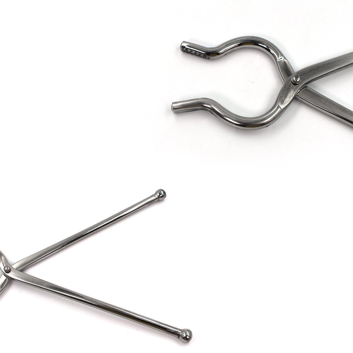 Stainless steel utensil holder tongs designed for easy gripping and serving in the kitchen