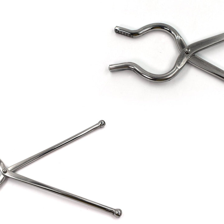 Stainless steel utensil holder tongs designed for easy gripping and serving in the kitchen