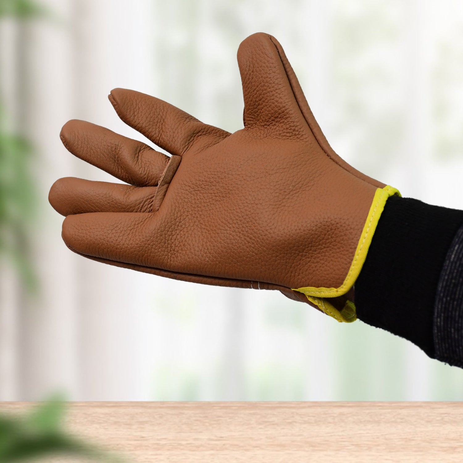 Superior eMart heavy duty gardening gloves in brown with yellow trim for robust hand protection
