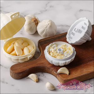 Superior eMart garlic press sharpener with garlic cloves and a wooden cutting board
