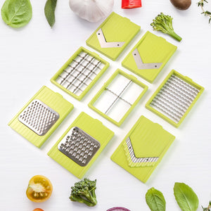 Superior eMart 9-in-1 kitchen vegetable slicer with multiple green interchangeable blades and stainless steel grater