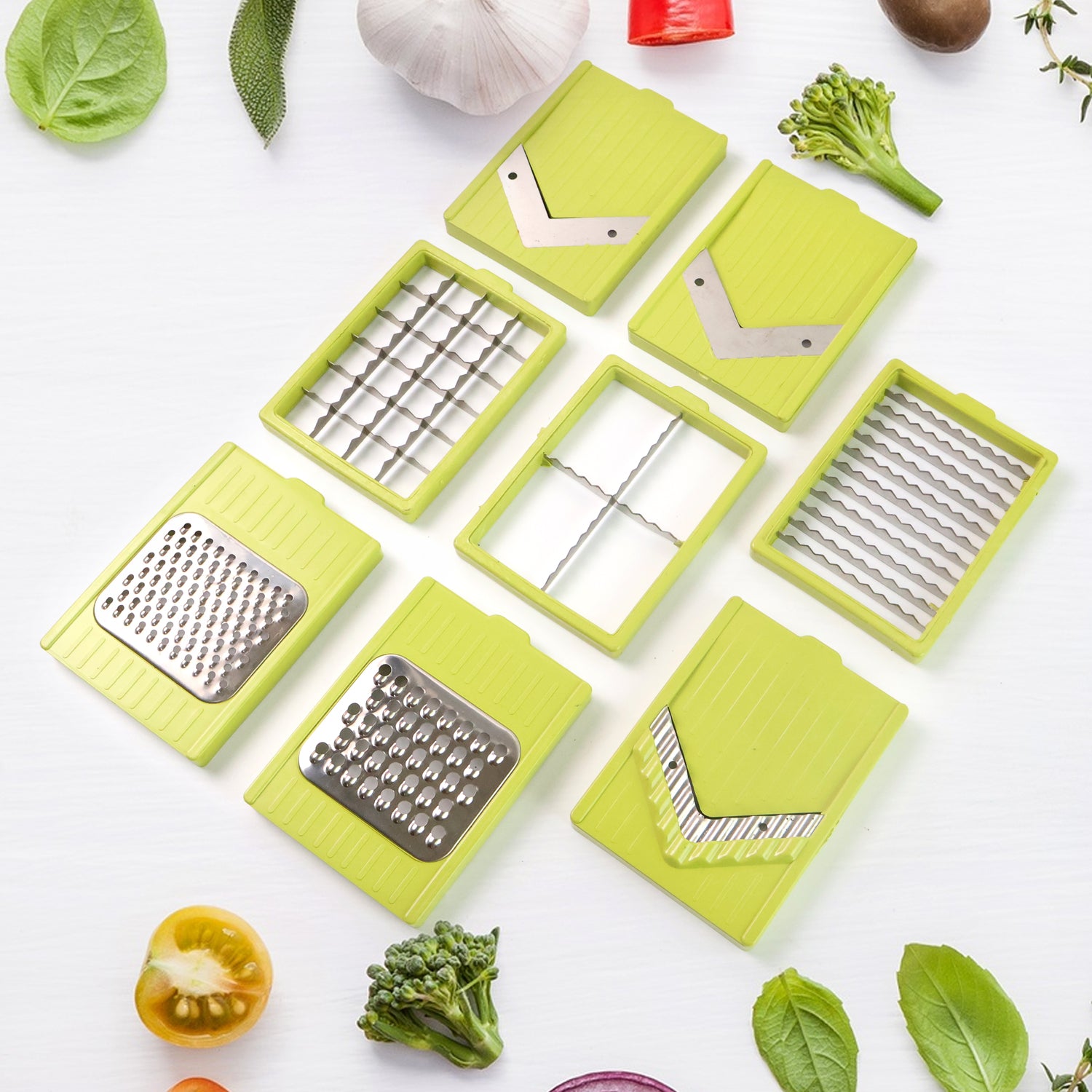Superior eMart 9-in-1 kitchen vegetable slicer with multiple green interchangeable blades and stainless steel grater