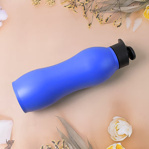 Superior eMart blue stainless steel water bottle 1000ml with black flip-top lid on beige background