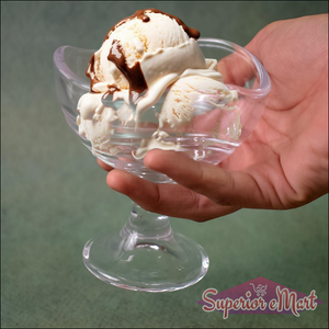 Stylish glass footed dessert bowl set showcasing ice cream with chocolate drizzle