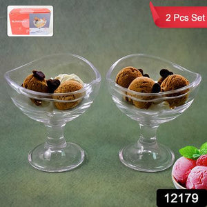 Glass footed dessert bowl set featuring two bowls filled with ice cream and toppings