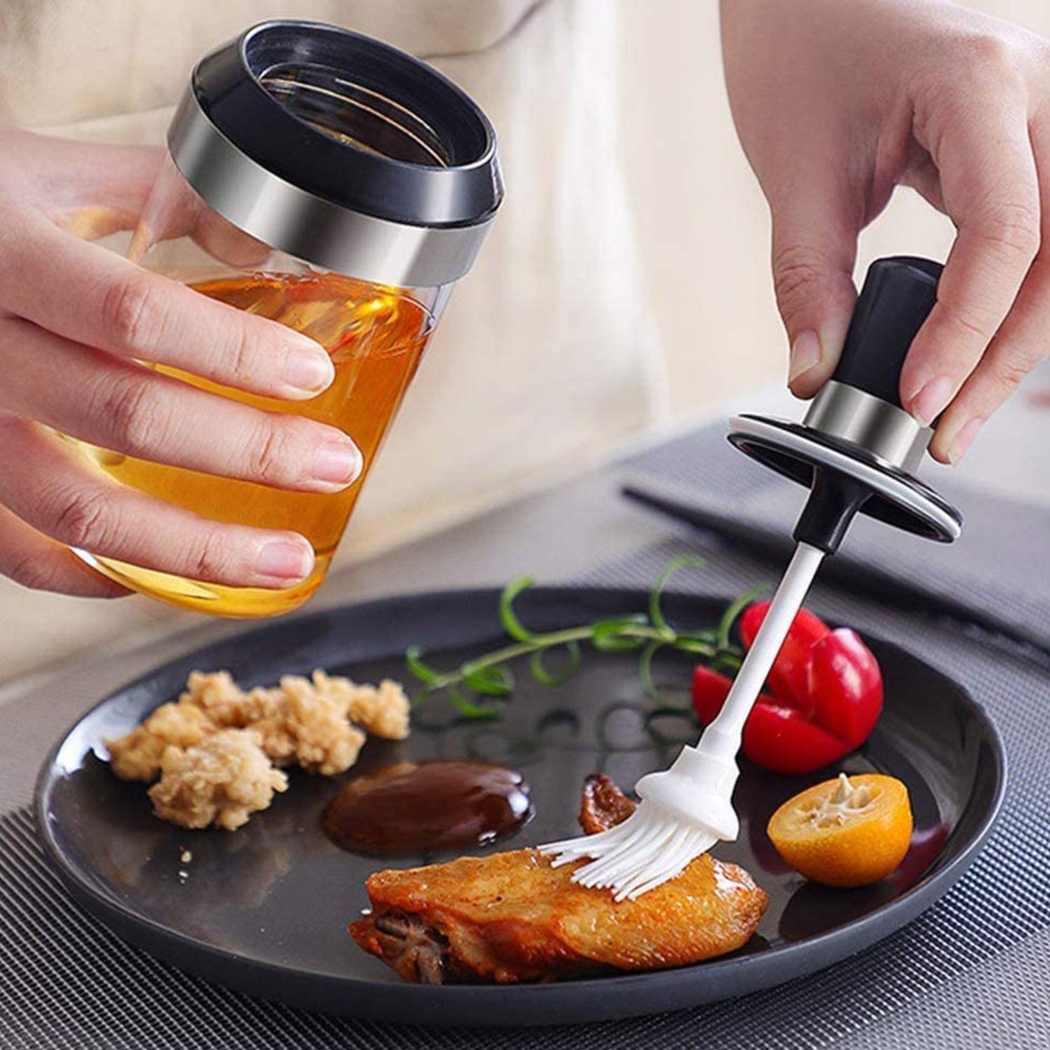 Glass oil dispenser with brush for easy application of oil on food while cooking