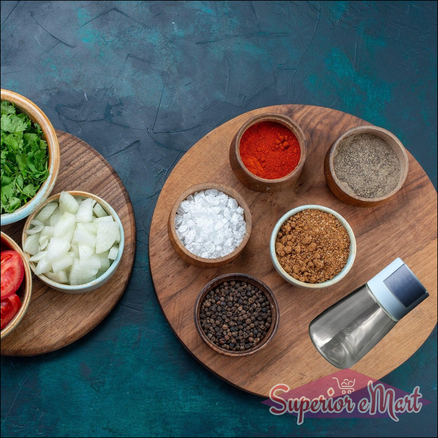 Glass salt dispenser for cooking displayed on a kitchen table with various spices and ingredients