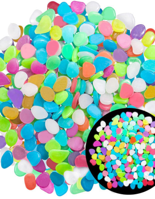 Colorful glow in the dark garden pebbles in assorted shapes and vibrant colors for outdoor decoration
