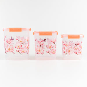 Set of three Superior eMart floral airtight storage containers with pink flower designs and orange lids