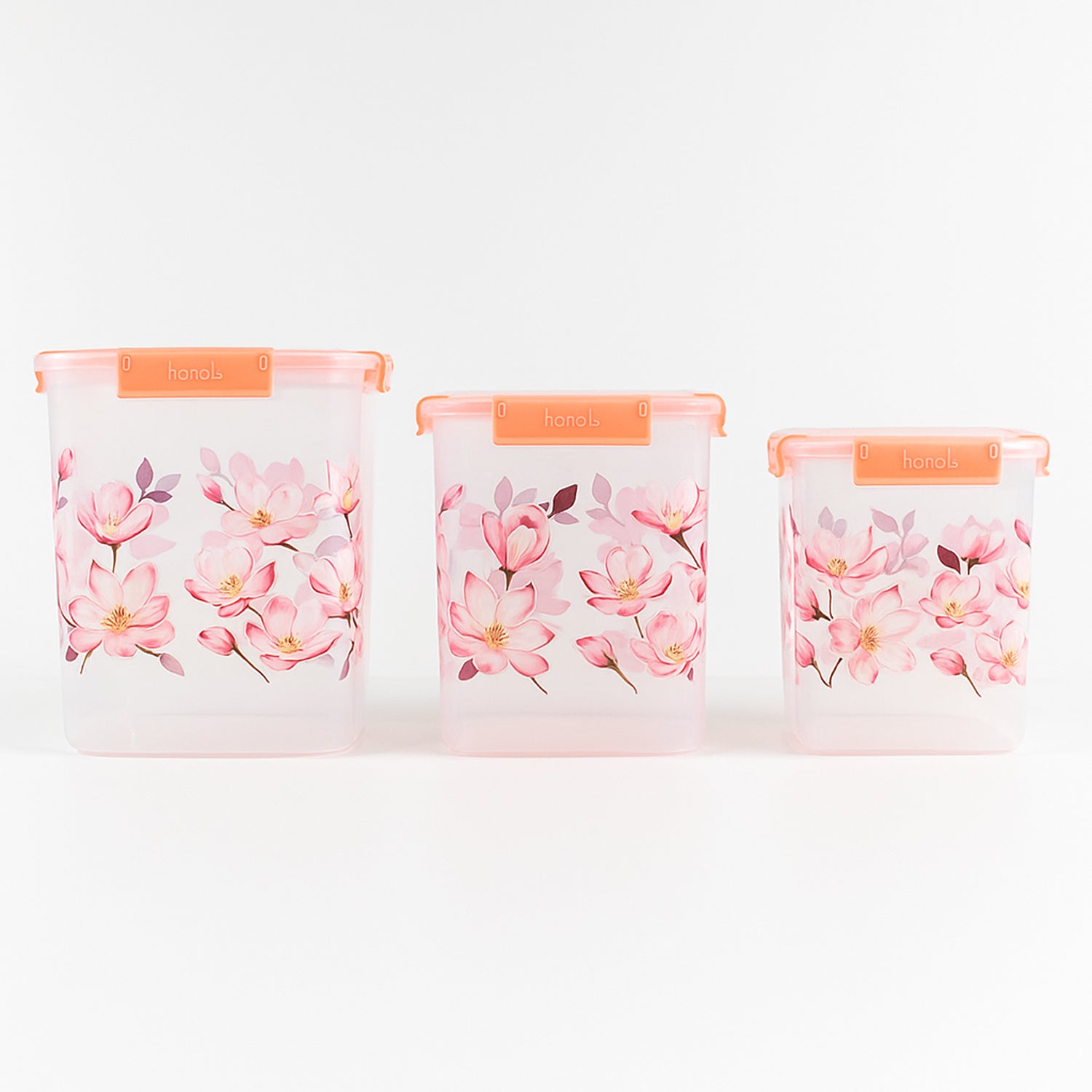 Set of three Superior eMart floral airtight storage containers with pink flower designs and orange lids