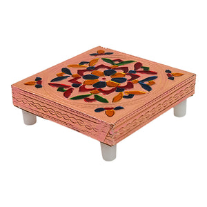 Handicraft puja table with vibrant floral design and sturdy legs for traditional home decor