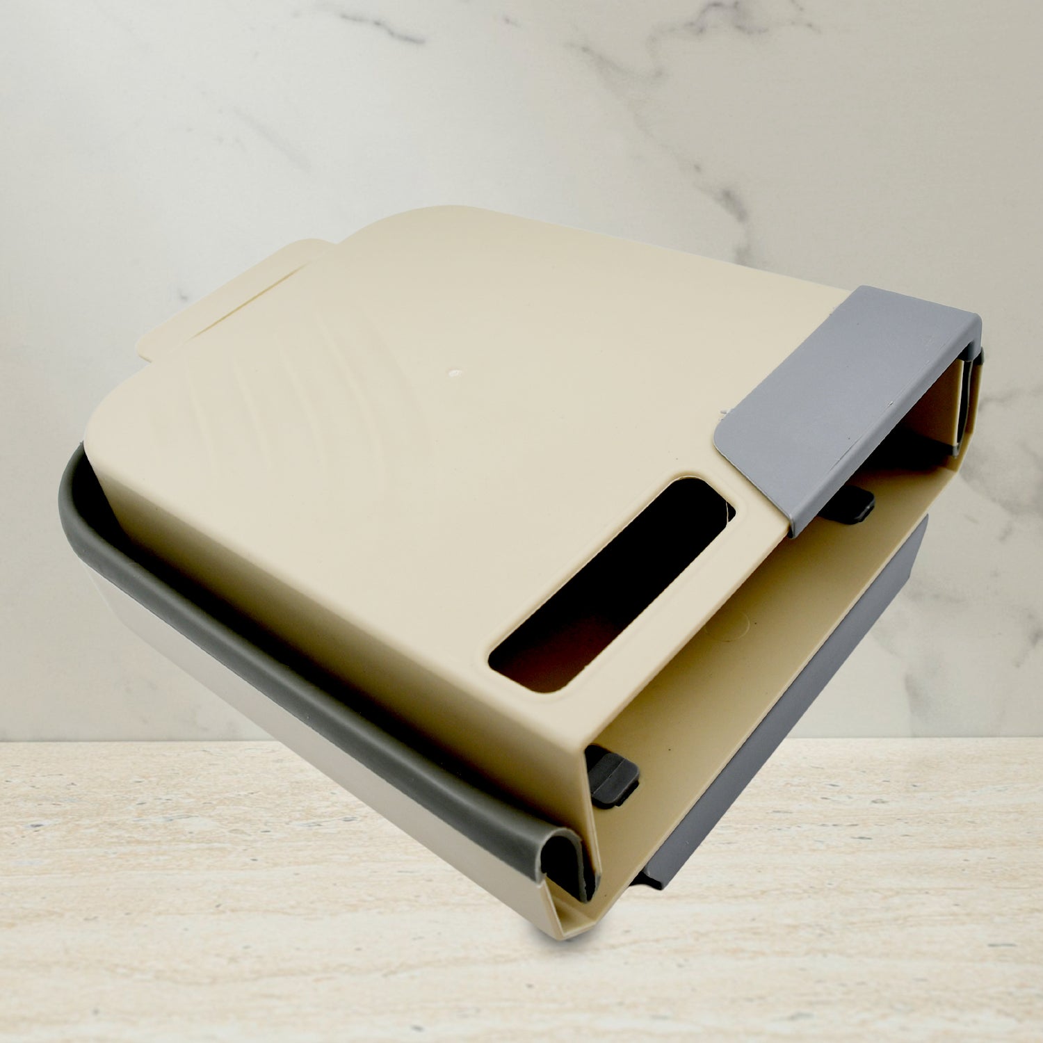 Compact hanging trash can for kitchen cabinet in beige and gray, perfect for space-saving waste management