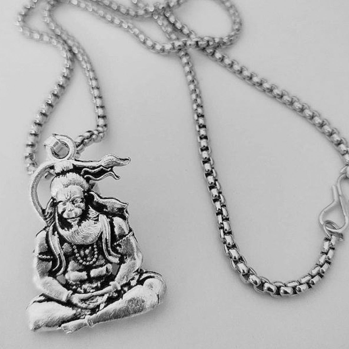 Hanuman Ji pendant necklace featuring a detailed silver charm on a sturdy chain