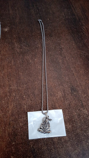 Hanuman Ji pendant necklace with detailed charm on a silver chain for spiritual wear