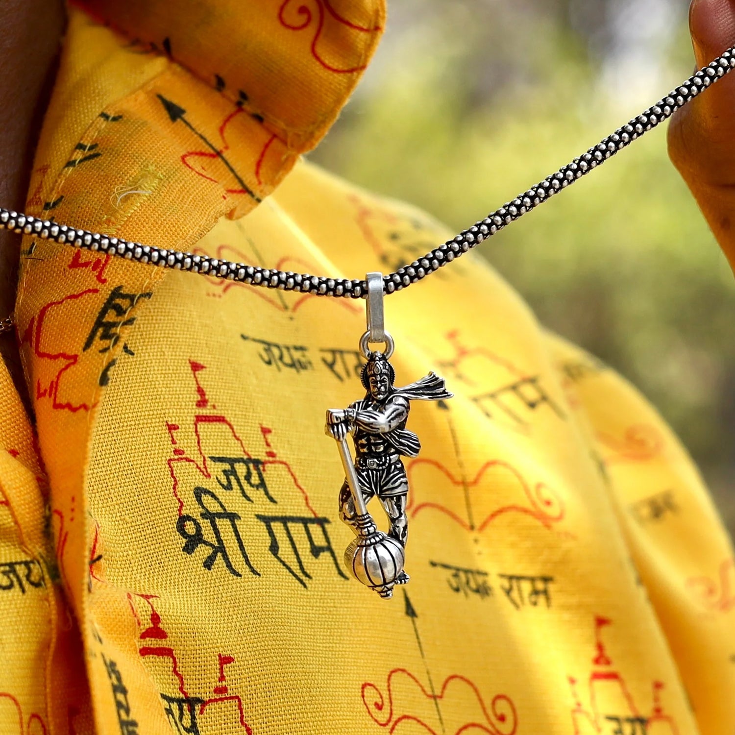 Stylish bracelet featuring a Hanuman ji pendant with gada, perfect for religious and spiritual fashion.