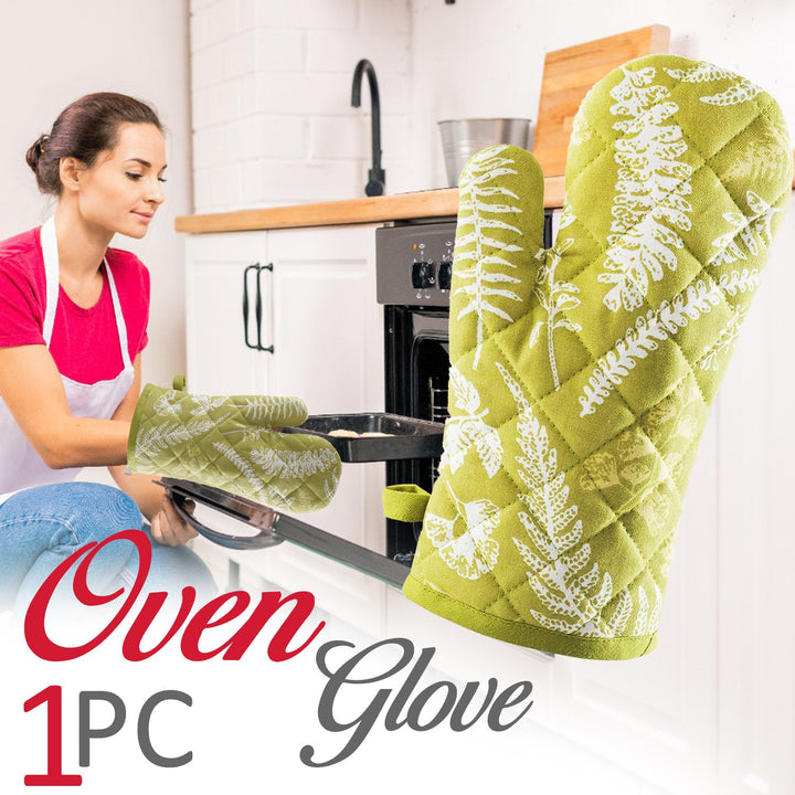 Green heat proof oven glove with decorative fern patterns for safe cooking and baking