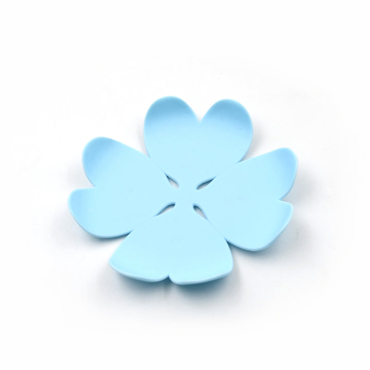 Flower-shaped blue silicone heat resistant coasters set for protecting surfaces