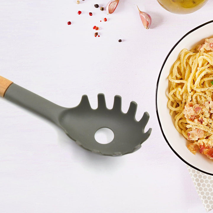 Heat resistant non stick cooking spoon in gray, perfect for stirring and serving pasta dishes