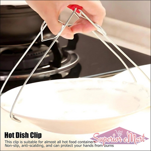 Stainless steel dish gripper tongs in use for safely handling hot food containers in the kitchen