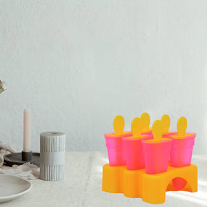 Colorful homemade kulfi maker set with five molds and spoons for making delicious frozen treats