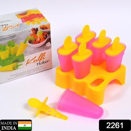 Homemade kulfi maker set with colorful molds and tray for making delicious frozen treats