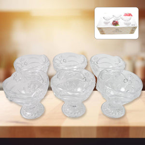 Clear glass ice cream cup set with intricate designs, perfect for serving desserts.