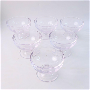 Set of six clear glass ice cream dessert bowls with elegant design for serving desserts