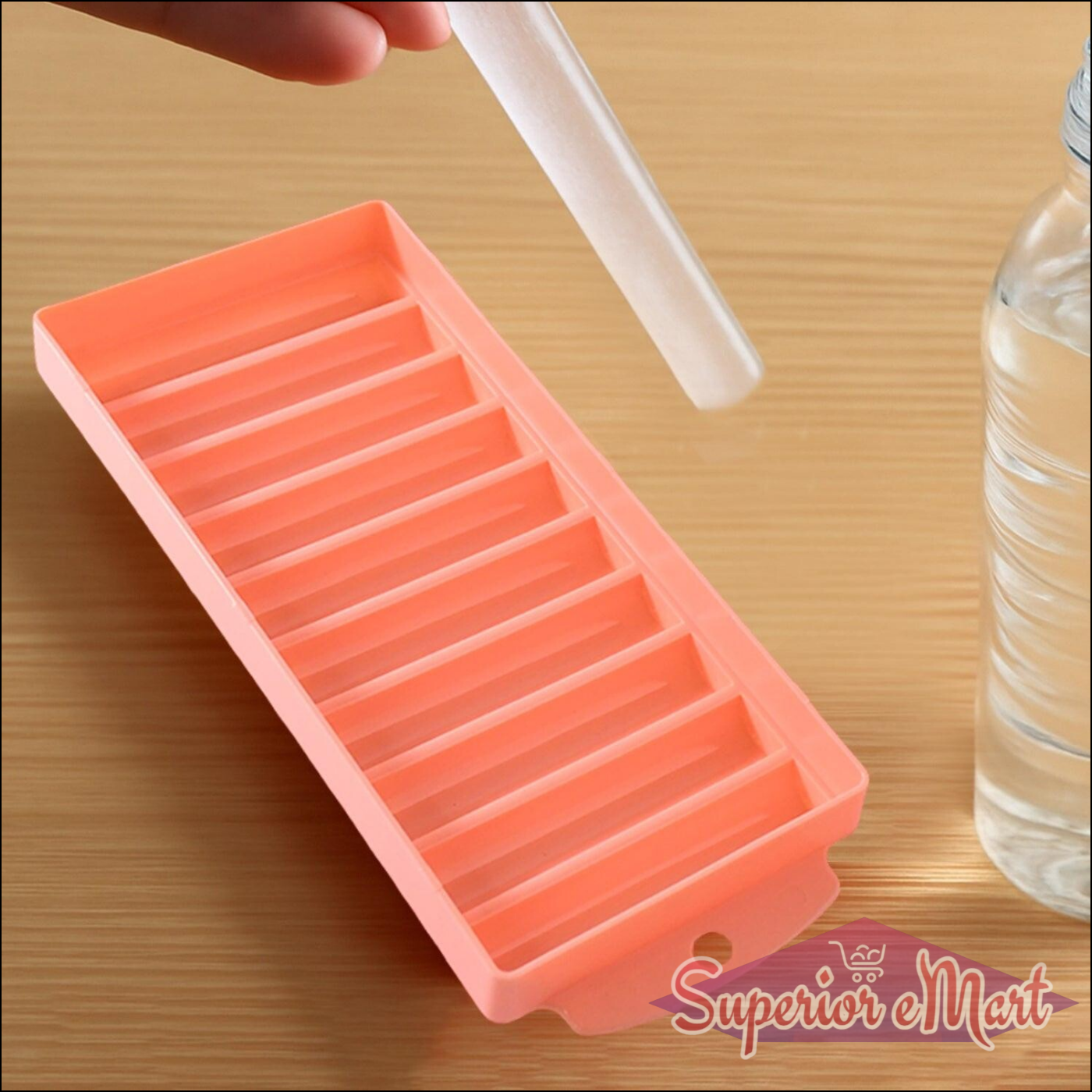 Compact ice stick tray in pink with easy-release design for making ice sticks