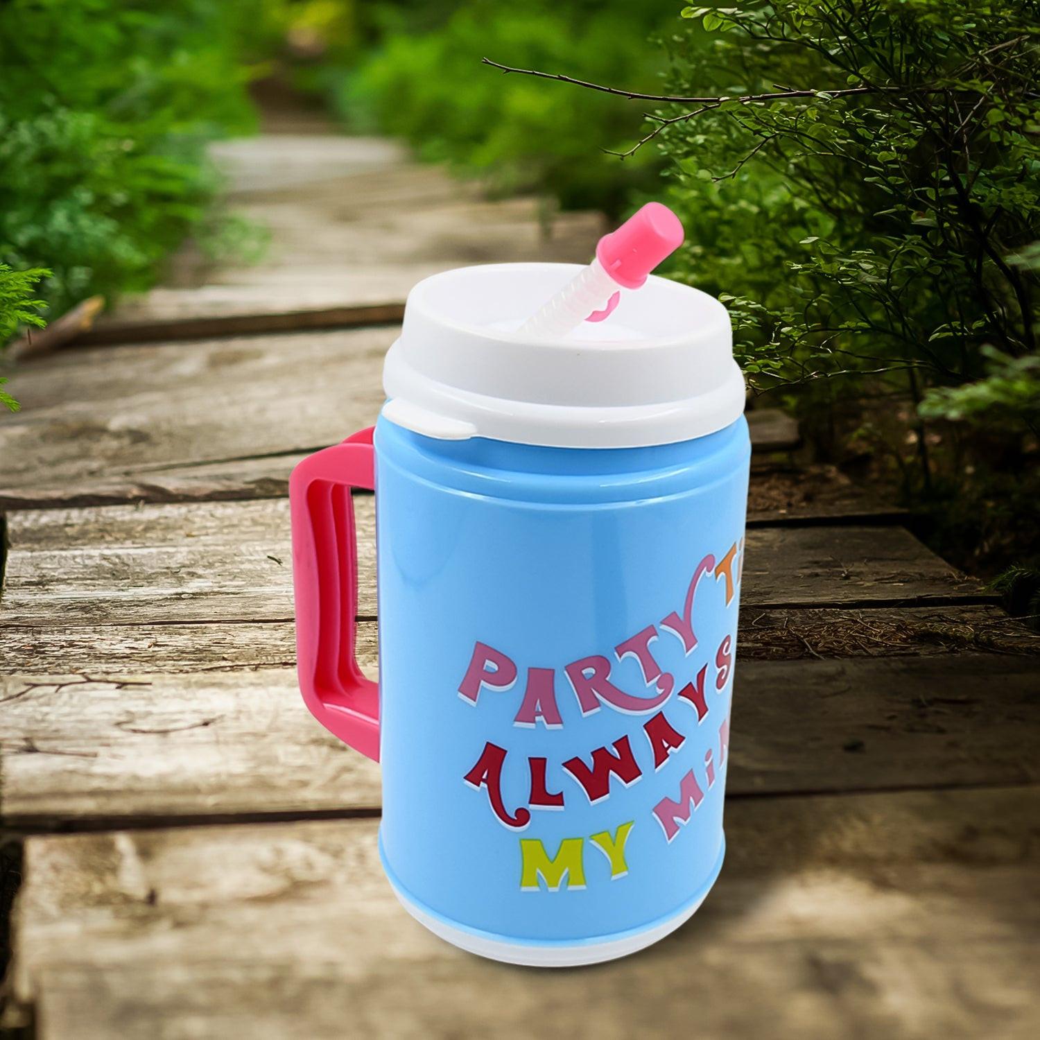 Bright blue insulated mug with lid and straw featuring a fun party design for beverages on the go