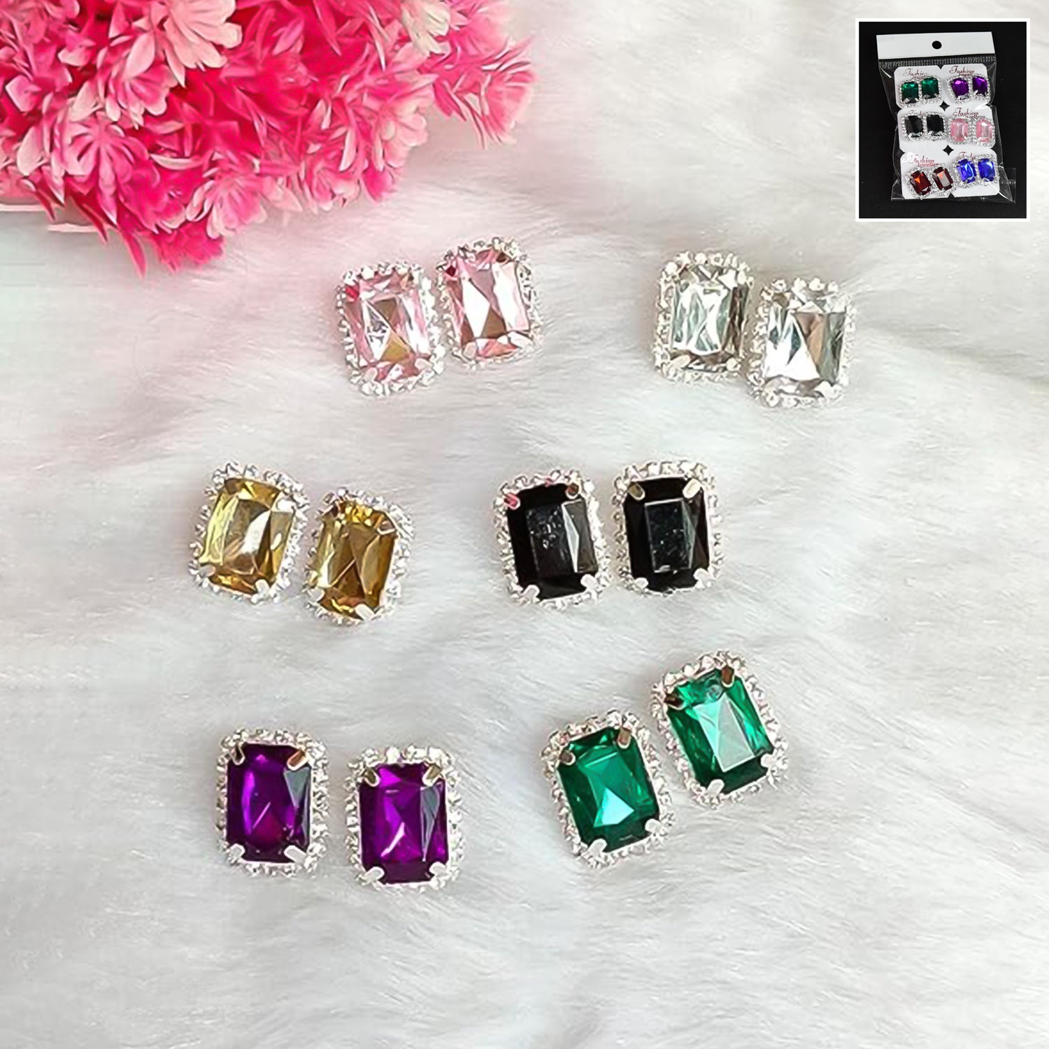Set of colorful interchangeable diamond earrings in various shapes and colors with elegant silver settings